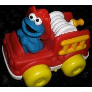    Sesame Street Cookie Monster Soft Fire Truck Toy: Toys & Games