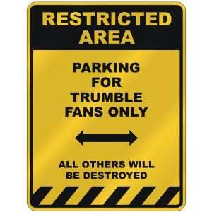  RESTRICTED AREA  PARKING FOR TRUMBLE FANS ONLY  PARKING 