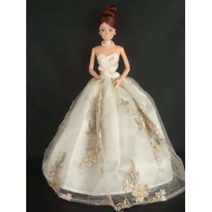 Ivory Strapless Ball Gown with Brown Lace Accents on the Botice Made 