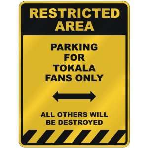  RESTRICTED AREA  PARKING FOR TOKALA FANS ONLY  PARKING 