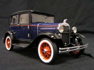 This is a 1930 Ford Model A Tudor by Franklin Mint 124 Scale. For 