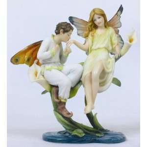   Fairy in Love Sitting on a Calla Lily Flower Figurine: Home & Kitchen