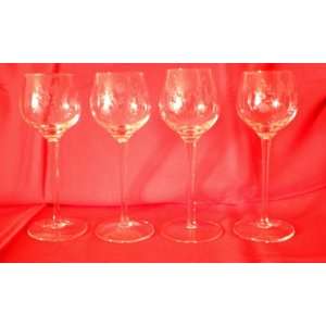   of Four Long Stemmed Heritage Crystal Wine Glasses 