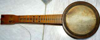 Cool Old Vintage Ukulele banjo with f holes  