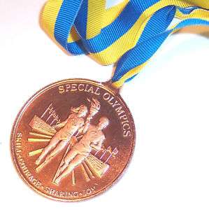 SPECIAL OLYMPICS TORCH MEDAL  
